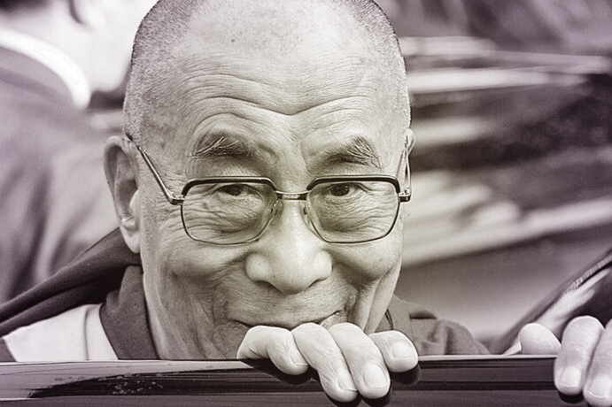 The Dalai Lama smiling - credit - Christopher Michel - https://commons.wikimedia.org/wiki/File:There_are_many_things_to_love_about_the_Dalai_Lama._But_his_smile_and_sense_of_humor_are_two_of_my_favorites._(23652016724).jpg